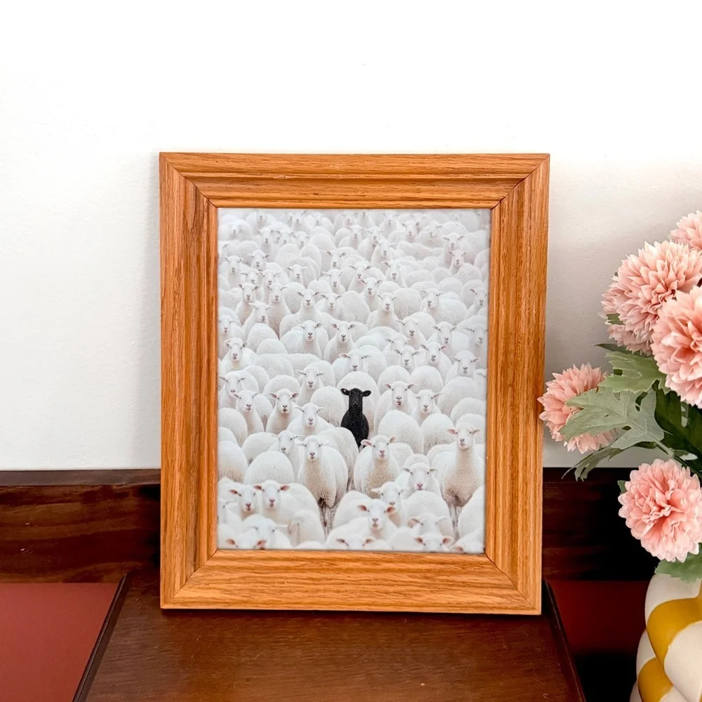 Black Sheep in a Crowd of White Lambs Canvas Art Print Vintage Wood Framed Art